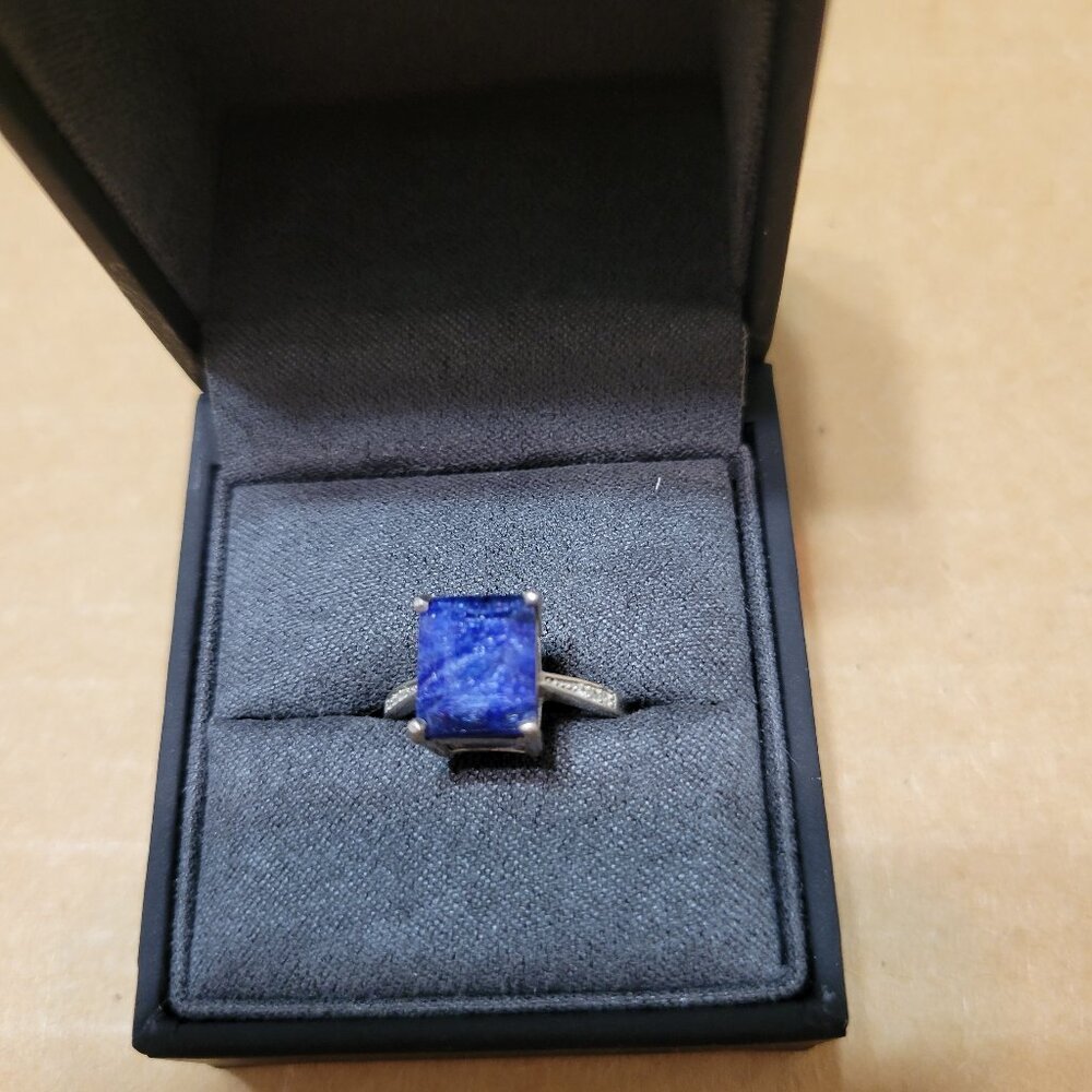 Blue stone ring.